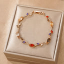 Gold Flower Tennis Bracelet with Coloured Stones, Dainty Gold Bracelet in Green, Red, Blue, Pink or White | Marliva