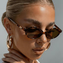 Sorrento small oval sunglasses with a tortoiseshell frame and brown lenses