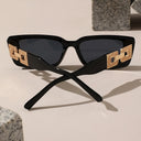 Portofino black square sunglasses with gold chain link temples, view 7