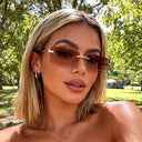 Santorini rimless sunglasses with gold temples and brown gradient lenses