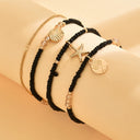 Beaded Anklet Set of 4, Black Beach Anklets with Starfish, Shell and Tree Charms, Stretch Fit | Marliva