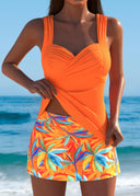 Danae orange tankini set with tropical print swim skirt