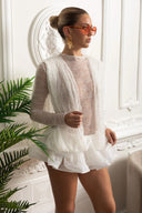 Delicate Long Sleeve Lace Dress with Ruffled Hem and Open Drape Front - White