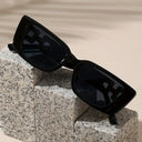 Portofino black square sunglasses with gold chain link temples, view 4