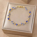 Gold Flower Tennis Bracelet with Coloured Stones, Dainty Gold Bracelet in Green, Red, Blue, Pink or White | Marliva