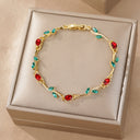 Gold Flower Tennis Bracelet with Coloured Stones, Dainty Gold Bracelet in Green, Red, Blue, Pink or White | Marliva