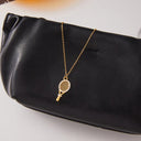 Gemma Gold Tennis Racket Necklace, view 7
