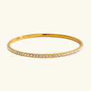 Juna Gold Bangle with Cubic Zirconia in 18k gold plated stainless steel
