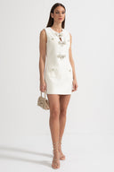 Textured Sleeveless Dress With Metal Embellished Bows - White