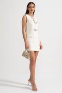 Textured Sleeveless Dress With Metal Embellished Bows - White