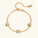 Katya Gold Cross Herringbone Bracelet in 18k gold plated stainless steel