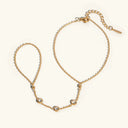 Clementine Gold Hand Chain Bracelet in 18k gold plated stainless steel