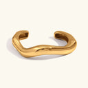 Wilma Asymmetrical Gold Bangle in 18k gold plated stainless steel
