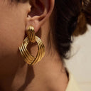 Dara Gold Knot Statement Earrings, view 2