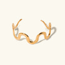 Ione Twisted Gold Bangle in 18k gold plated stainless steel