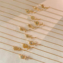 Wilhelmina Gold Birth Flower Necklace, view 11