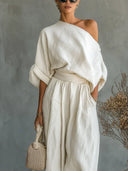 Sinead white two-piece set with off-the-shoulder top and tapered pants, view 2