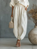 Sinead white two-piece set with off-the-shoulder top and tapered pants, view 3