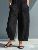 Stevie black sleeveless jumpsuit with mandarin collar and button front, view 4