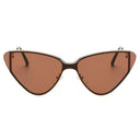 Tulum cat eye sunglasses with a gold metal frame and tinted lenses, view 4