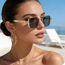 Biarritz square tinted fashion glasses with side shields and a gold frame