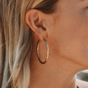 Renata Large Gold Twisted Statement Hoop Earrings, view 4