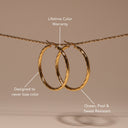 Renata Large Gold Twisted Statement Hoop Earrings, view 5