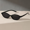 Capri oval sunglasses with a retro frame and tinted lenses