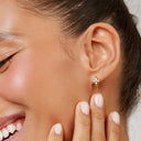Emmy Daisy Charm Huggie Hoop Earrings, view 4