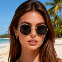 Ravello round tinted fashion glasses with a gold metal frame, view 3
