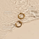 Matilde Hammered Huggie Hoop Earrings, view 17