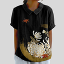 Davina black floral blouse with chrysanthemum motif and rounded collar