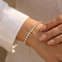 Aurora gold tennis bracelet worn on the wrist