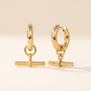Remi gold huggie hoops with T-bar charm