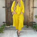 Vera two-piece set with oversized V-neck tunic and cropped wide-leg trousers, view 7