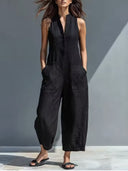 Stevie black sleeveless jumpsuit with mandarin collar and button front