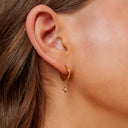Hilda Gold Star Charm Huggie Earrings