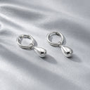 Madison Smooth Sculptural Drop Hoop Earrings, view 11
