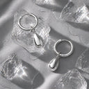 Madison Smooth Sculptural Drop Hoop Earrings, view 7