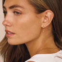 Hilda Gold Star Charm Huggie Earrings, view 4