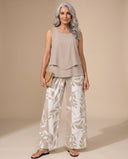 Andie beige sleeveless top with leafy botanical print wide-leg trousers